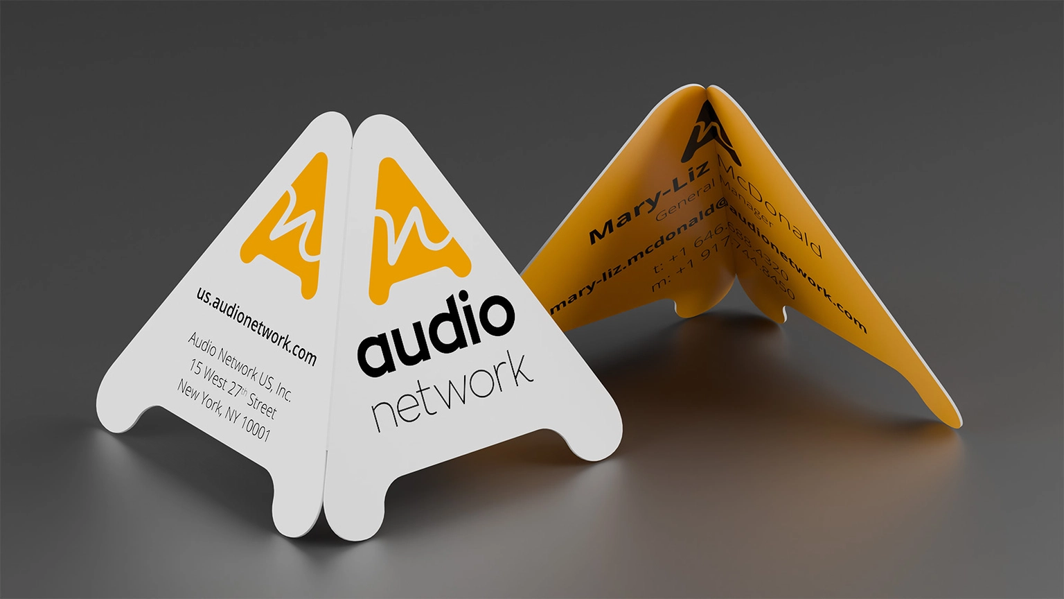 Rendering of Audio Network business card design.
