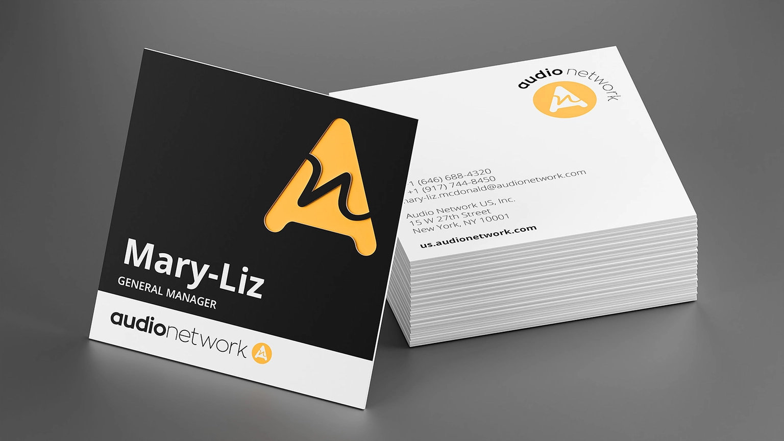 Rendering of Audio Network business card design.
