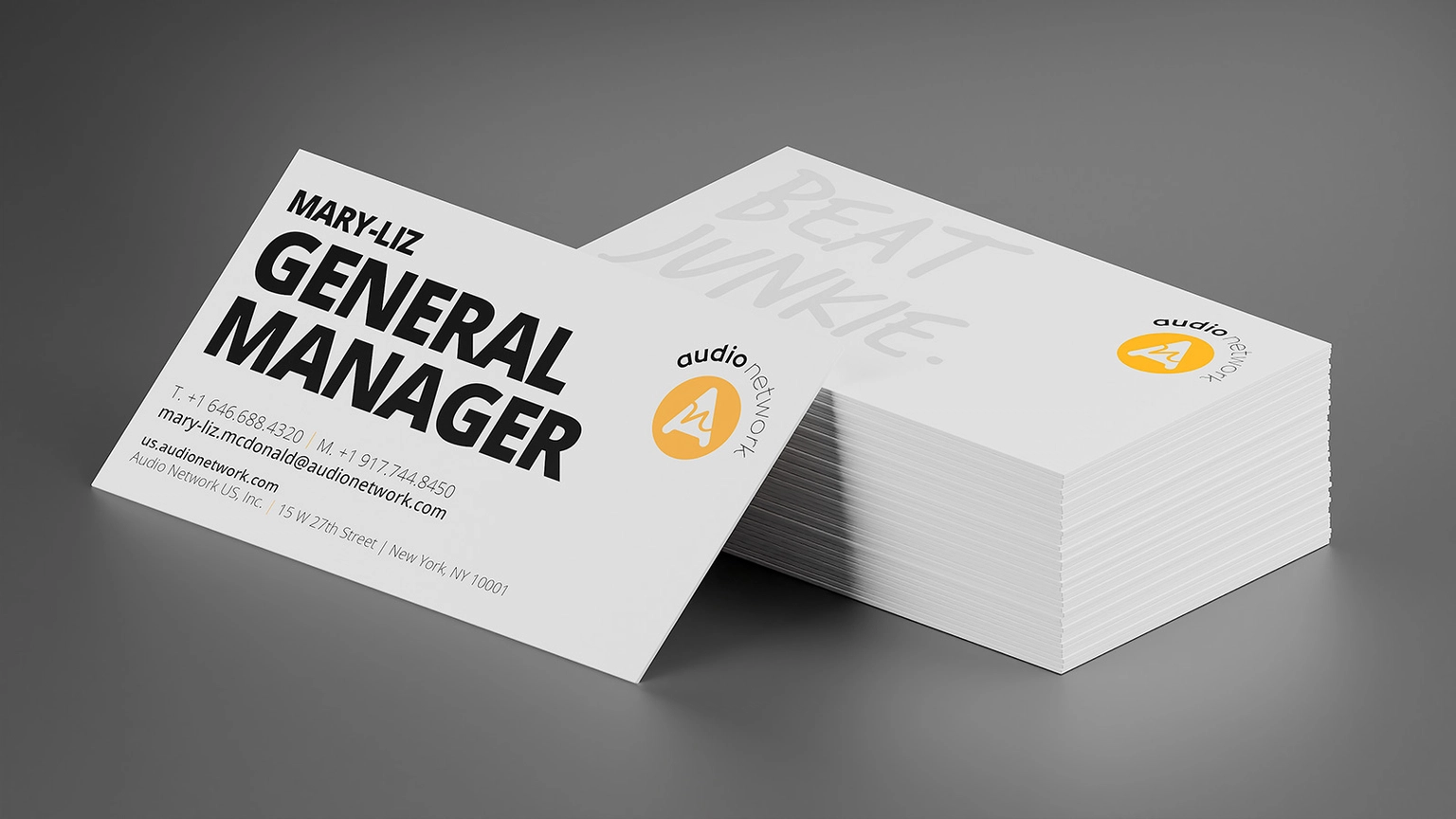 Rendering of Audio Network business card design.